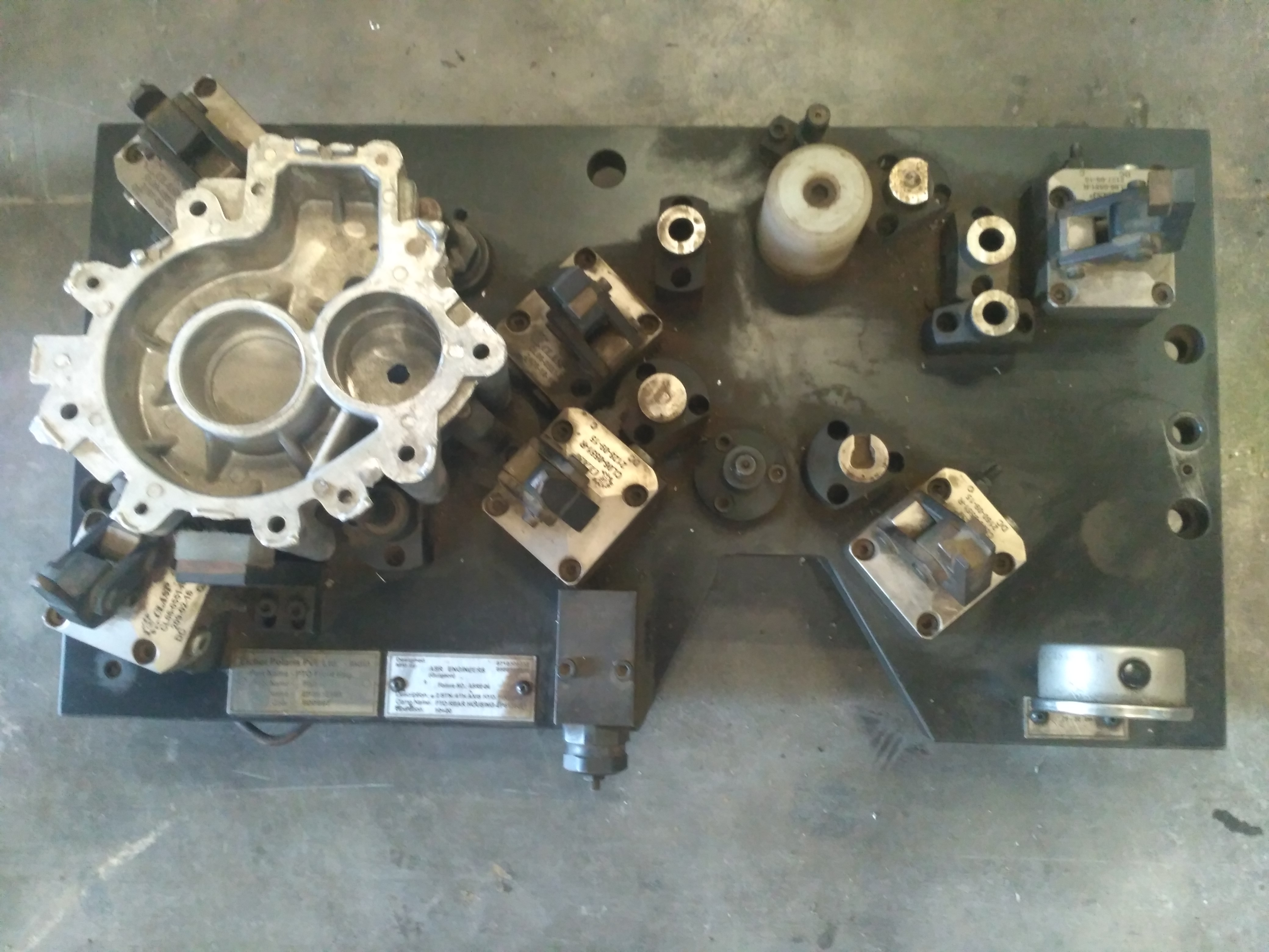 ASR precision hydraulic fixture with a machined component